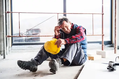 Medical benefits and traumatic brain injuries concept. An injured worker in need of a knowledgable Alpharetta workers' compensation lawyer.