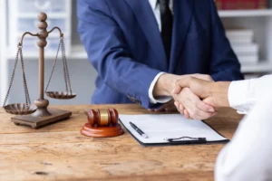 Injured Atlanta warehouse workear meeting with workers compensation lawyer for free case review