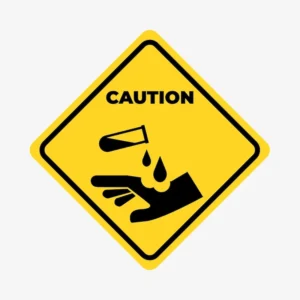 A chemical caution sign represents one of several types of workplace injuries.