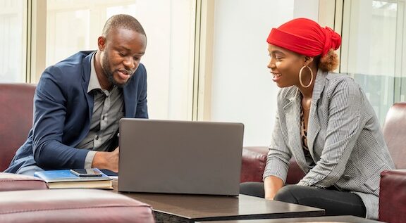 Professional consultation between a lawyer and a client discussing personal injury claims related to distracted driving accidents.