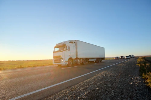 semi truck on highway, Atlanta truck accident lawyer concept