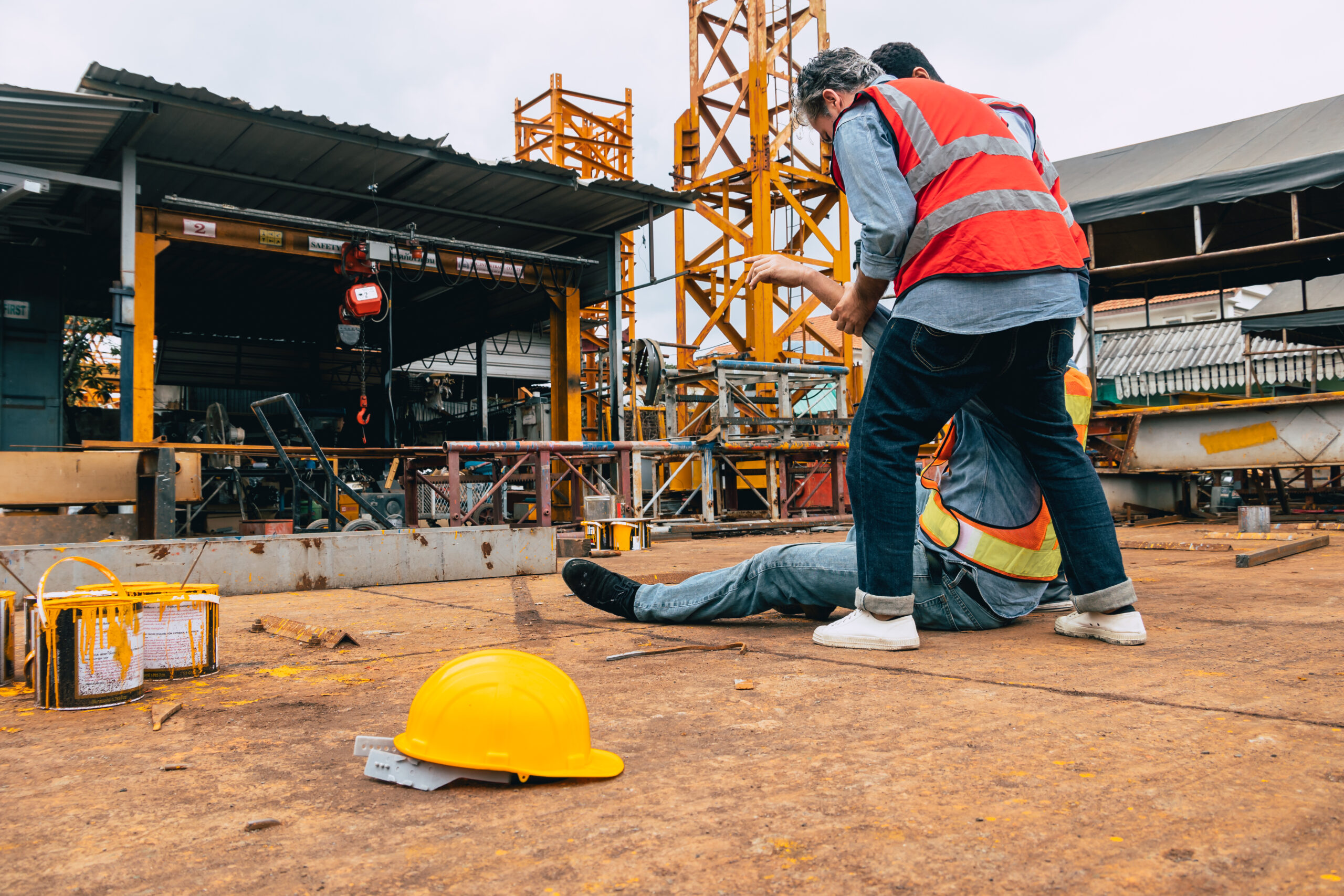 Injured Atlanta construction worker on a Cobb County job site after a workplace accident seeking workers' compensation lawyer representation in Georgia