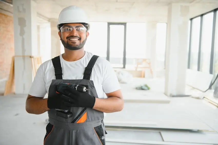 Recovered Atlanta construction worker back on the job site after successfully winning full workers' compensation benefits with legal representation in Georgia