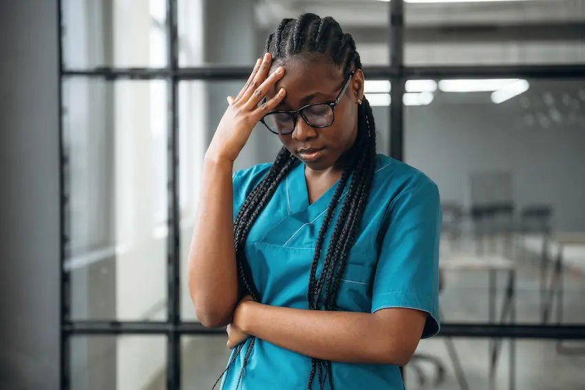 Healthcare worker in Alpharetta clinic experiencing workplace injury covered by Georgia workers' compensation