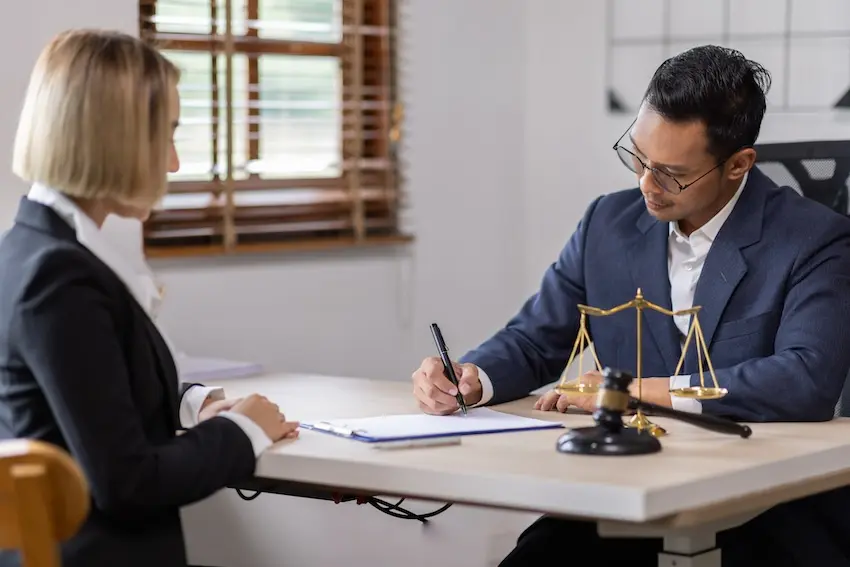 Workers' compensation lawyer consulting with healthcare worker in Marietta — Law Offices of Humberto Izquierdo Jr PC