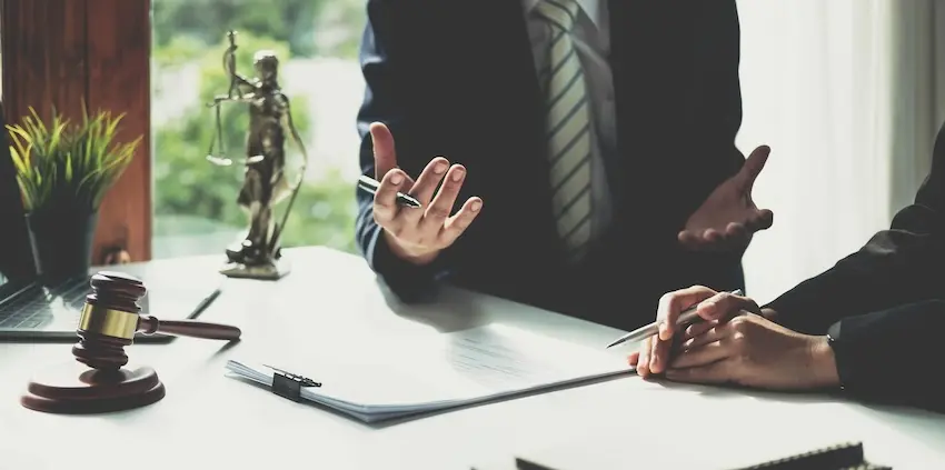 Manufacturing workers compensation lawyer in Norcross Georgia reviewing an injured workers claim