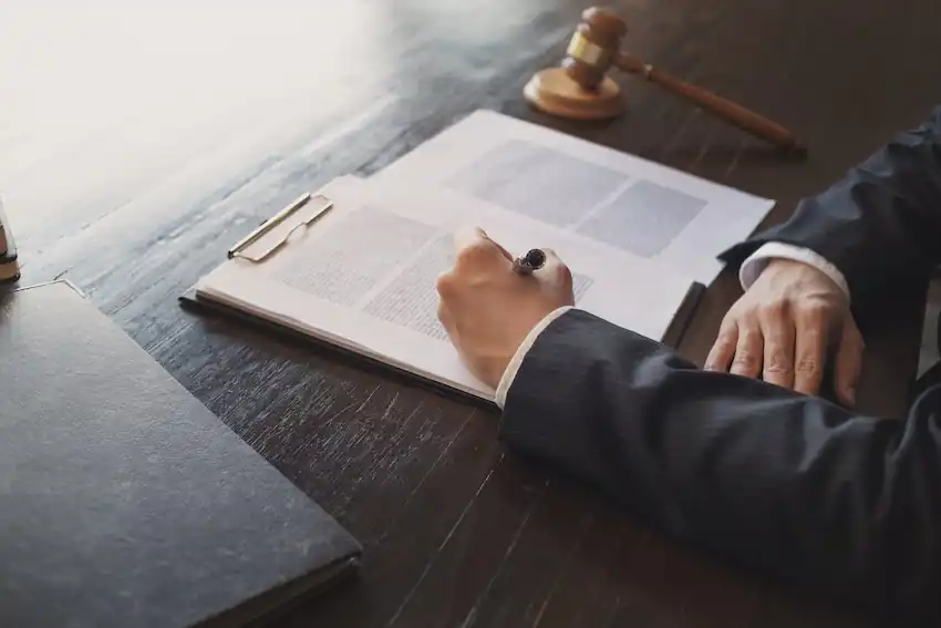 Attorney Grant Tall reviewing a car accident case file and filing deadline