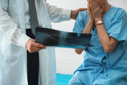 Doctor Showing Patient Scans