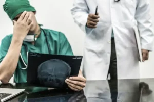 Doctor Looking At Scans