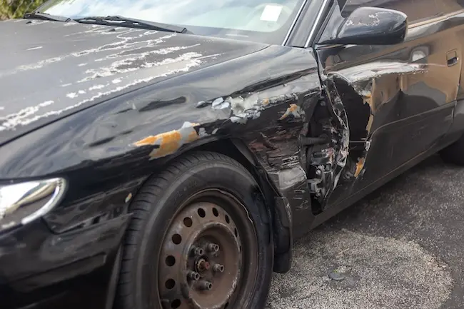Damaged vehicle after a car accident representing the personal injury and workers compensation cases handled by the Law Offices of Humberto Izquierdo Jr. PC in Cumming Georgia