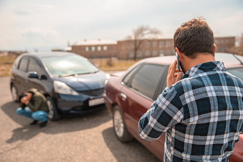 A man calls police after a car accident in Cumming, Georgia.